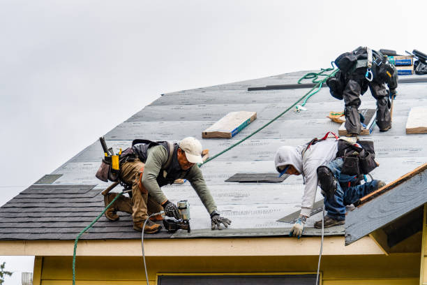 Professional Gutter Installation technician working in Oakville, CT